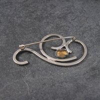 Vintage Sterling Blue Rhinestone Swirl Brooch