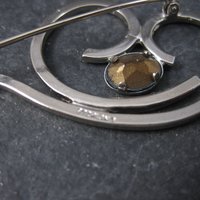 Vintage Sterling Blue Rhinestone Swirl Brooch