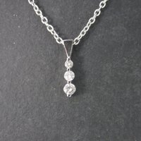 Estate 10K .28 Carat Graduated Diamond Pendant