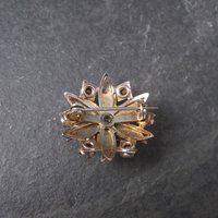 Vintage Starburst Green Rhinestone Brooch Pin