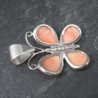 Sterling Carved Angel Skin Coral Butterfly Pendant