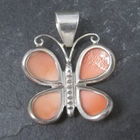 Sterling Carved Angel Skin Coral Butterfly Pendant