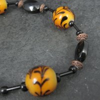 Orange Lampwork Black Glass Bead Strand Cousins 9.25"