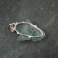 Carved Blue Topaz Cherub Pendant