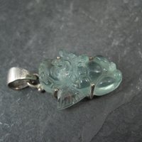 Carved Blue Topaz Cherub Pendant