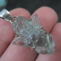 Carved Blue Topaz Cherub Pendant