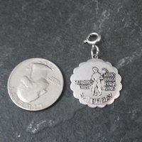 1976 Saturdays Child Charm Sarah Coventry