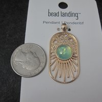 Gold Sunburst Pendant by Bead Landing