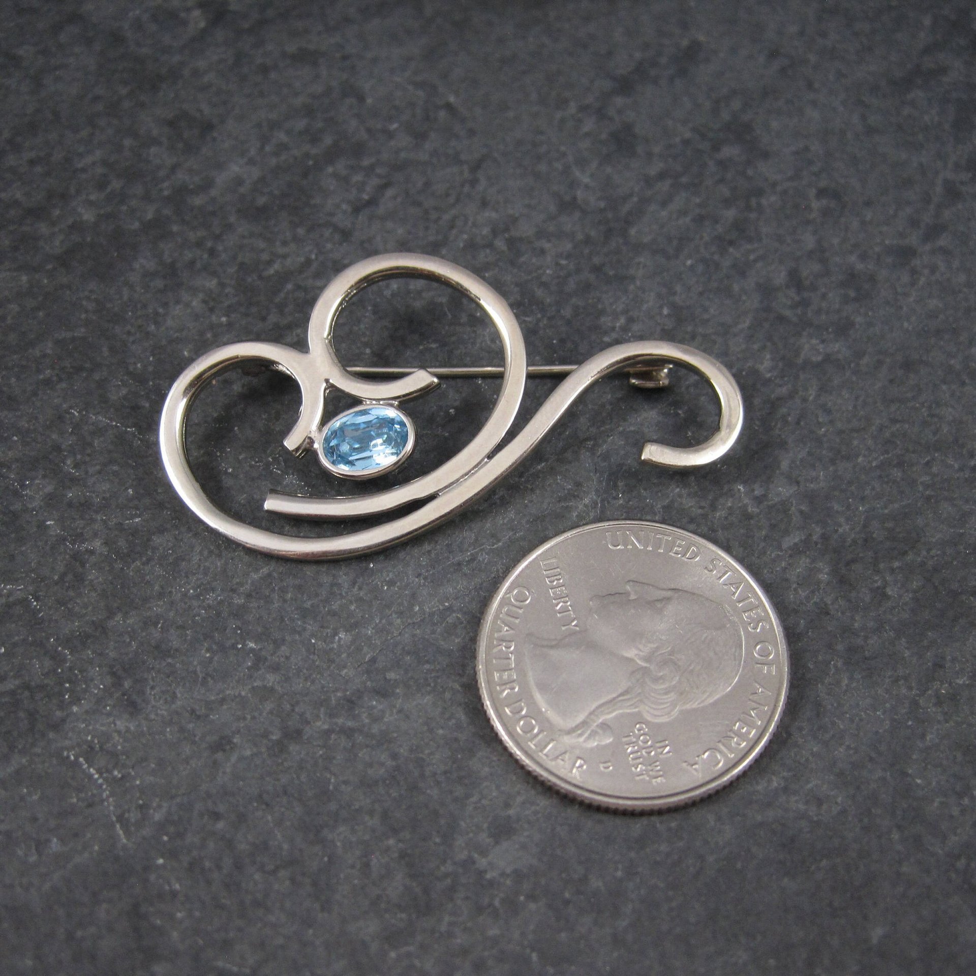 Vintage Sterling Blue Rhinestone Swirl Brooch