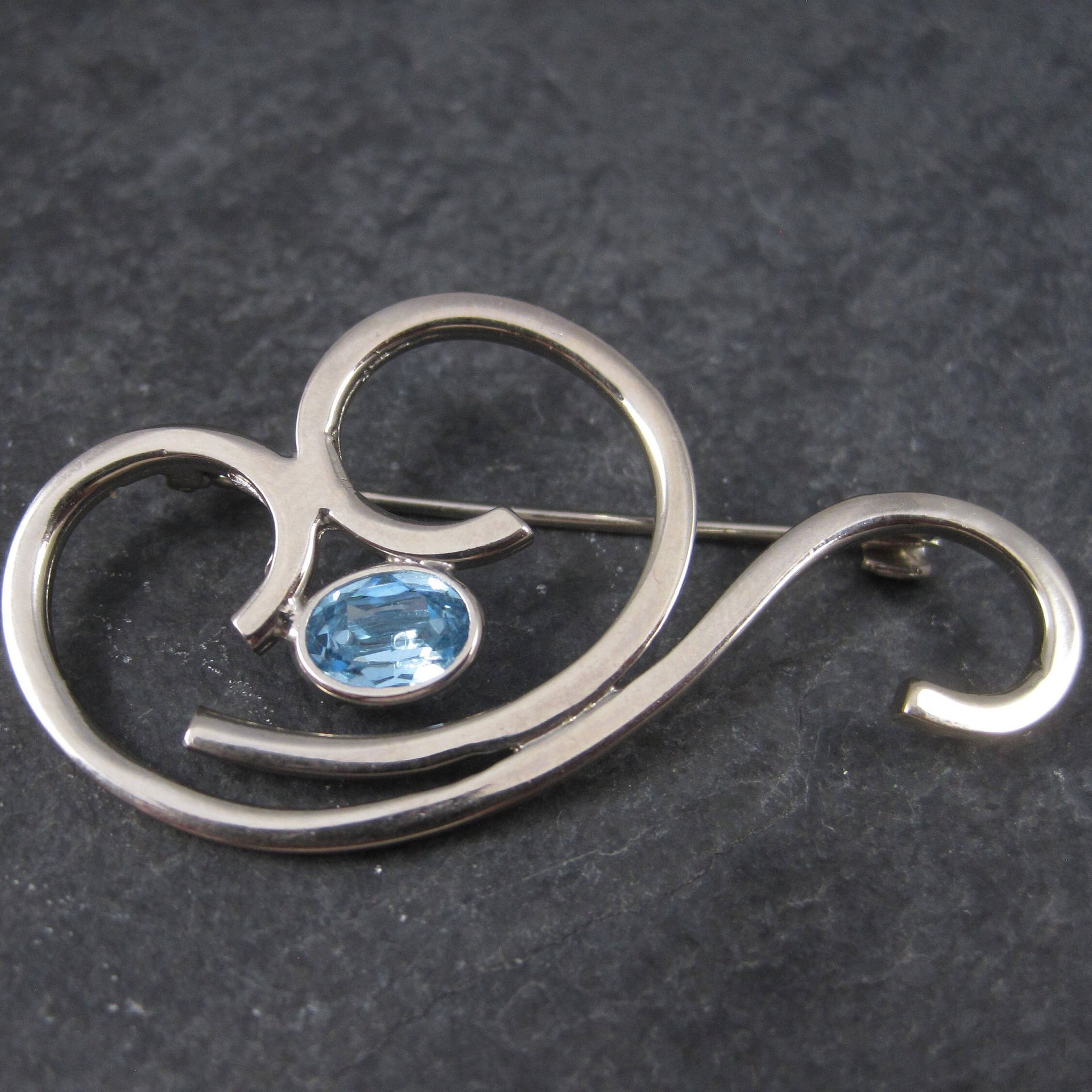 Vintage Sterling Blue Rhinestone Swirl Brooch