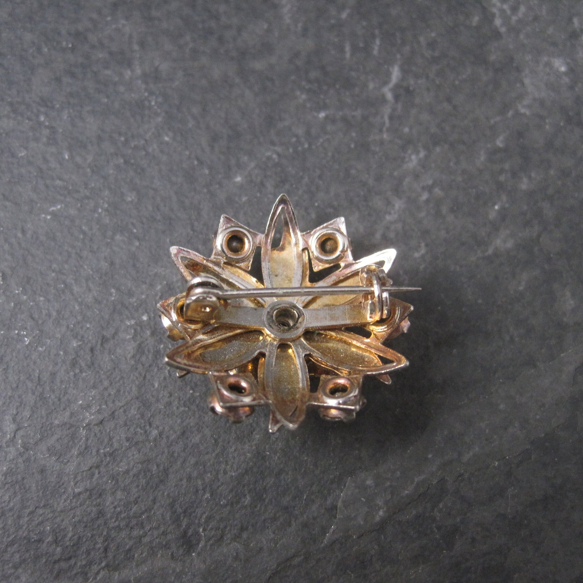 Vintage Starburst Green Rhinestone Brooch Pin