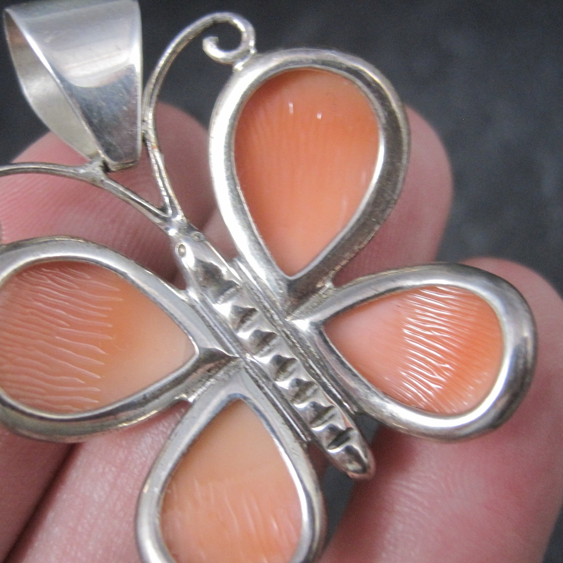 Sterling Carved Angel Skin Coral Butterfly Pendant