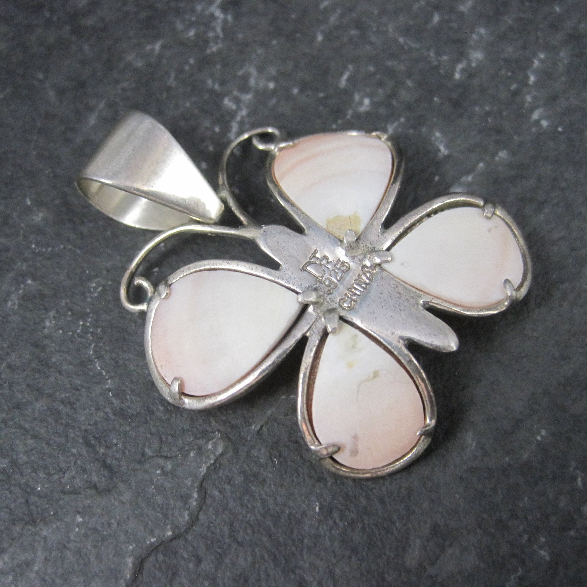 Sterling Carved Angel Skin Coral Butterfly Pendant