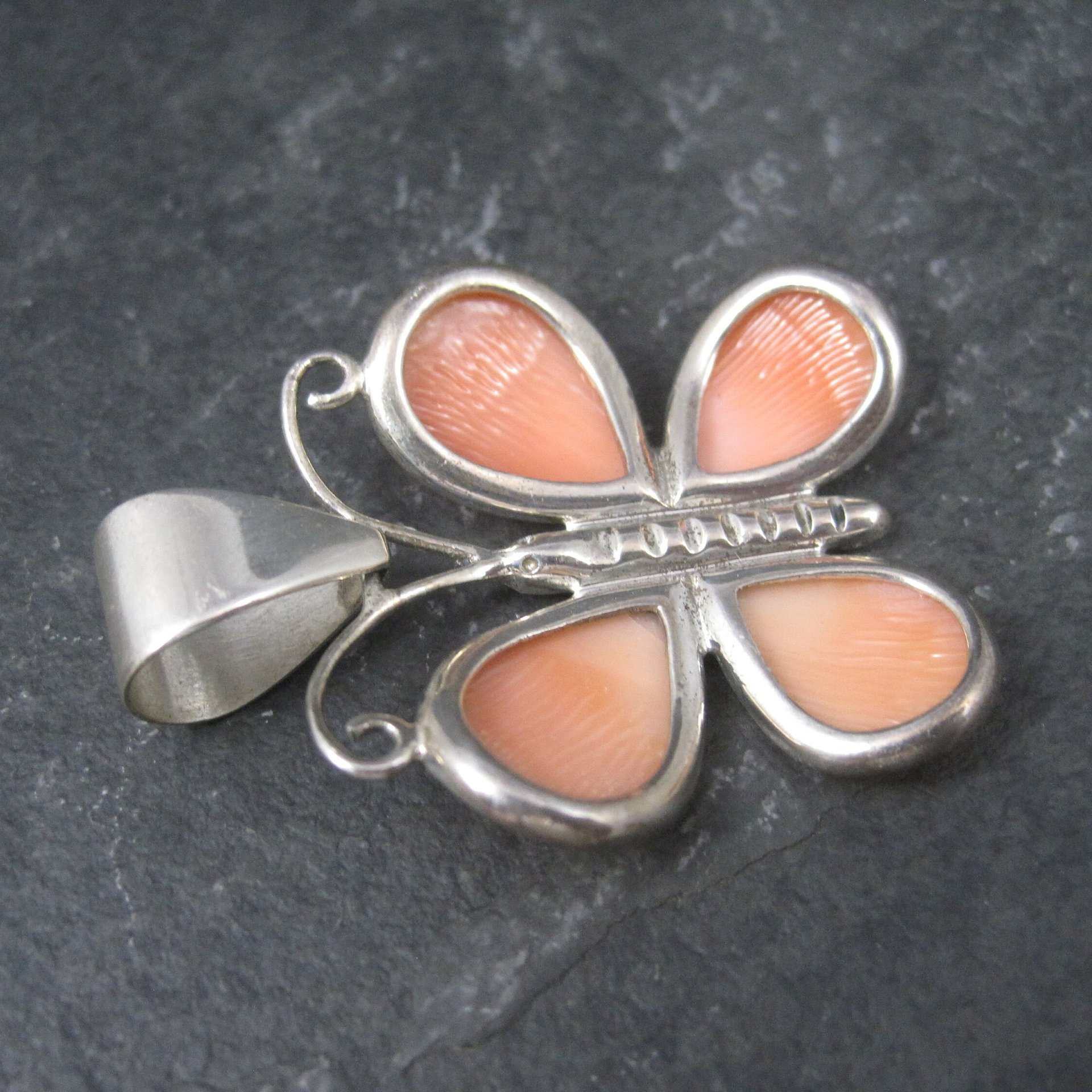 Sterling Carved Angel Skin Coral Butterfly Pendant
