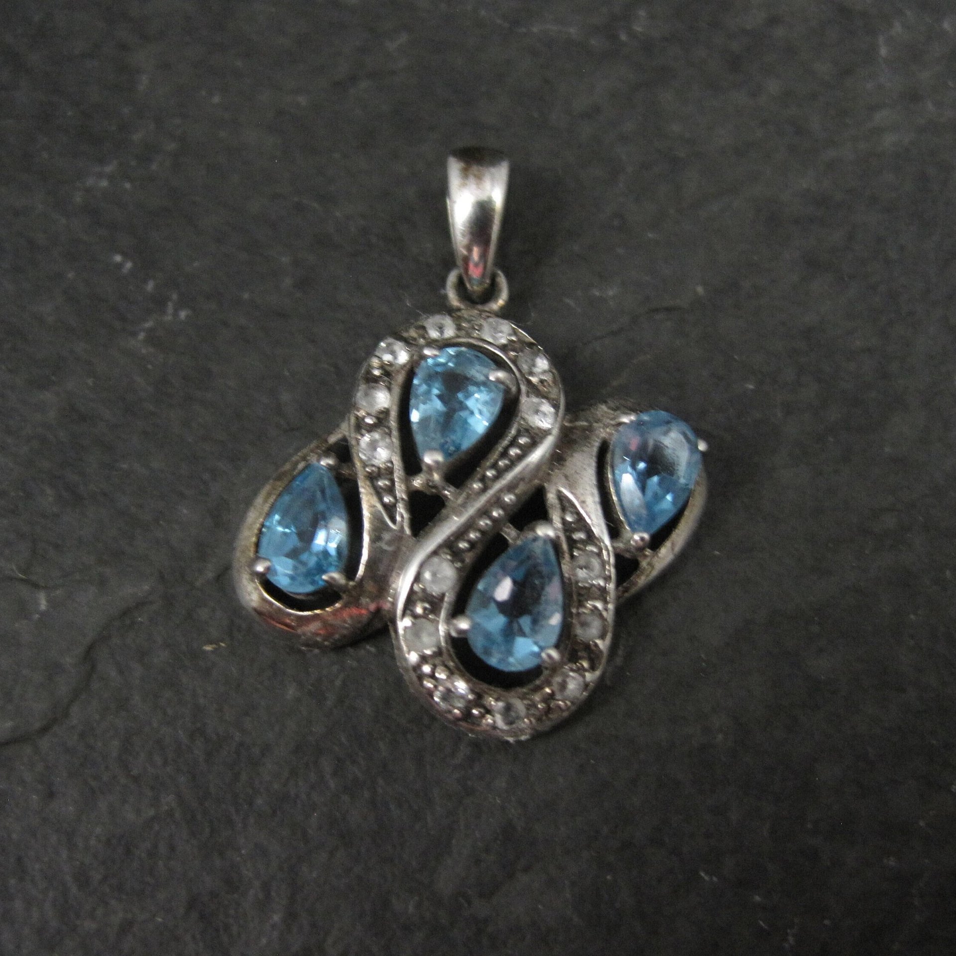Unique Sterling Silver Blue Topaz & Diamond Pendant