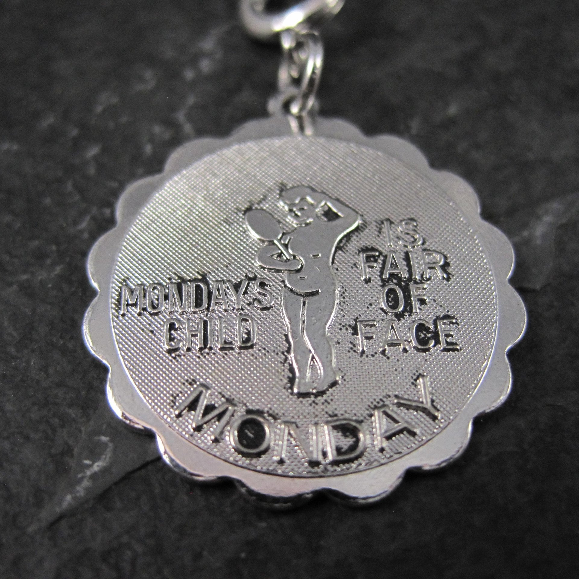 1976 Mondays Child Charm Sarah Coventry