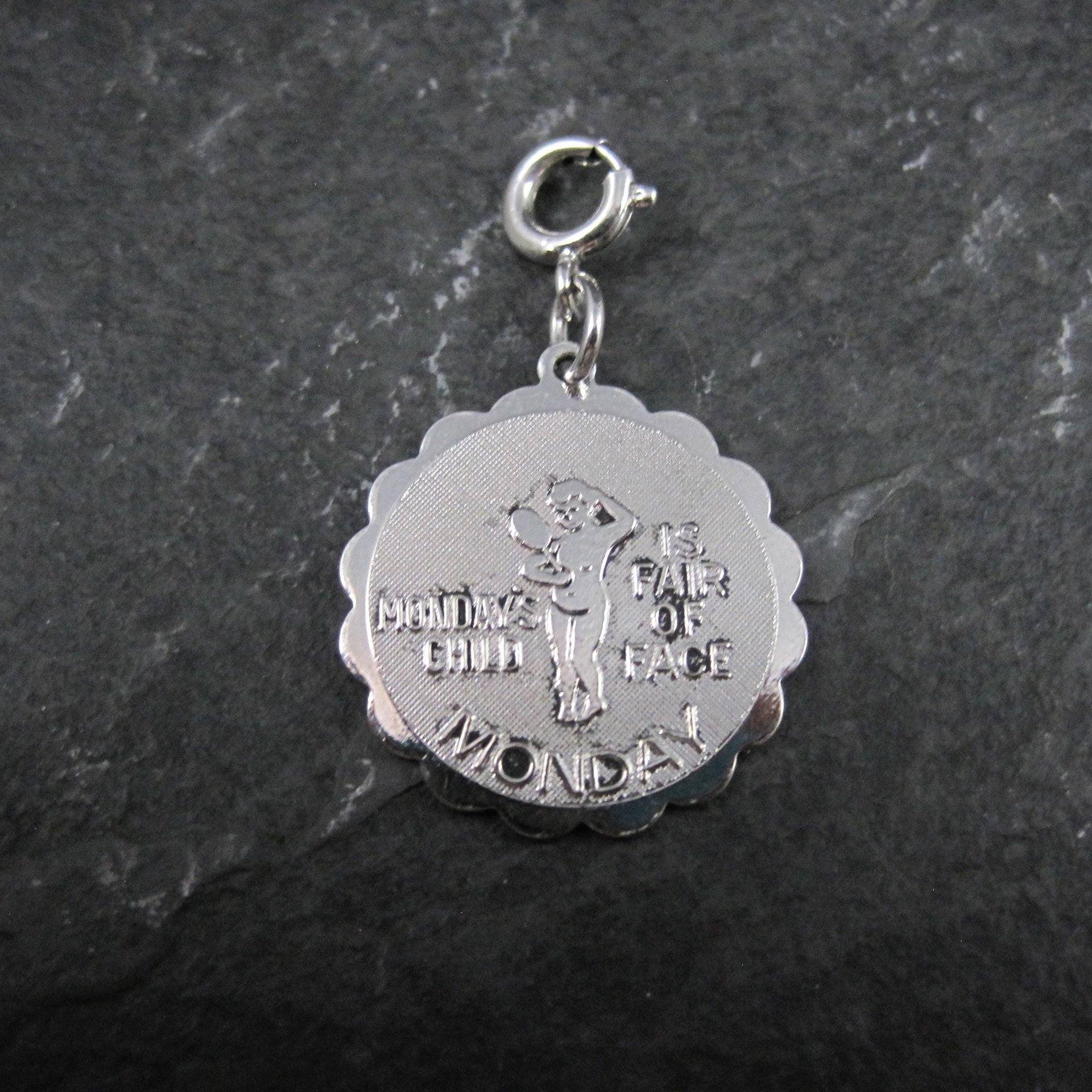 1976 Mondays Child Charm Sarah Coventry