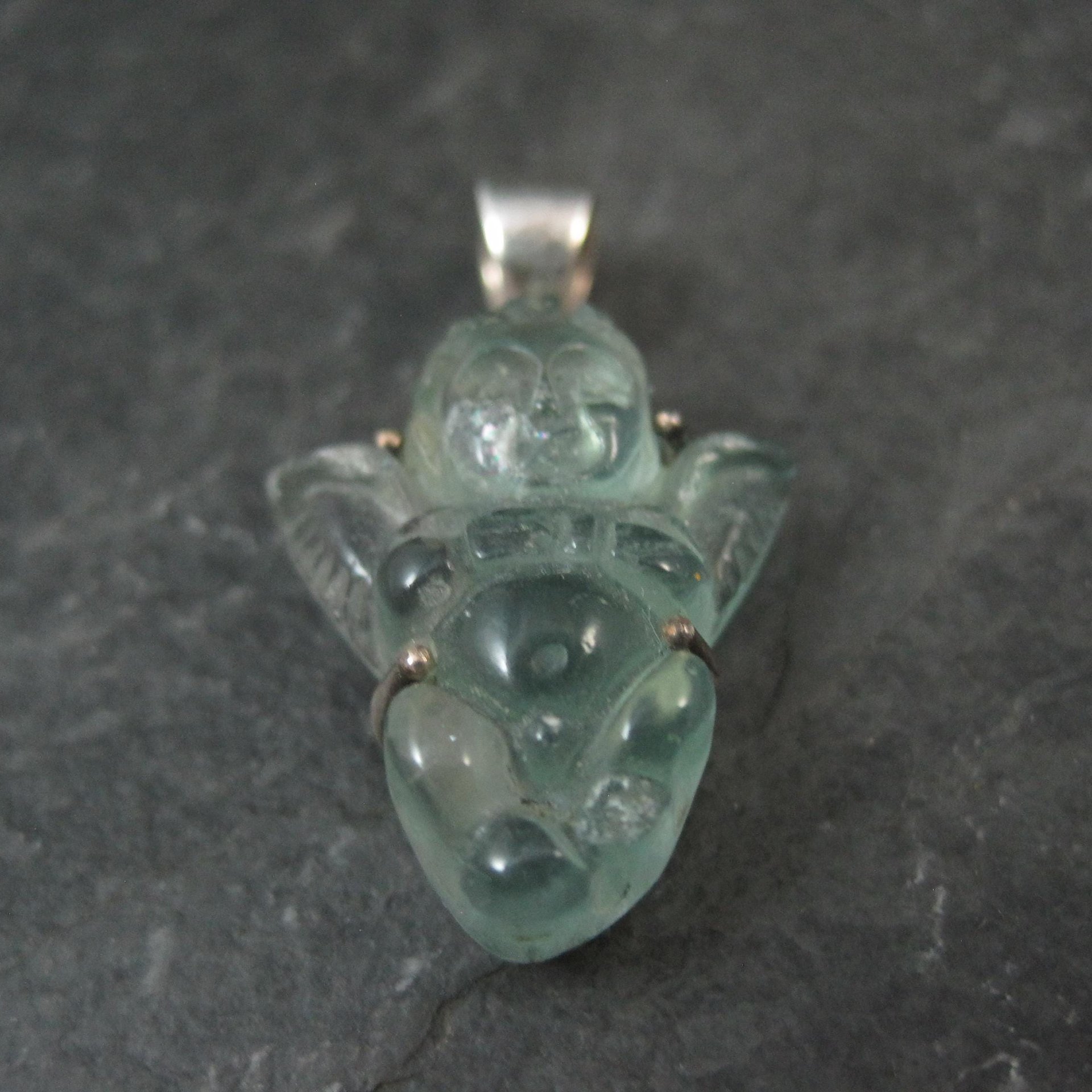 Carved Blue Topaz Cherub Pendant