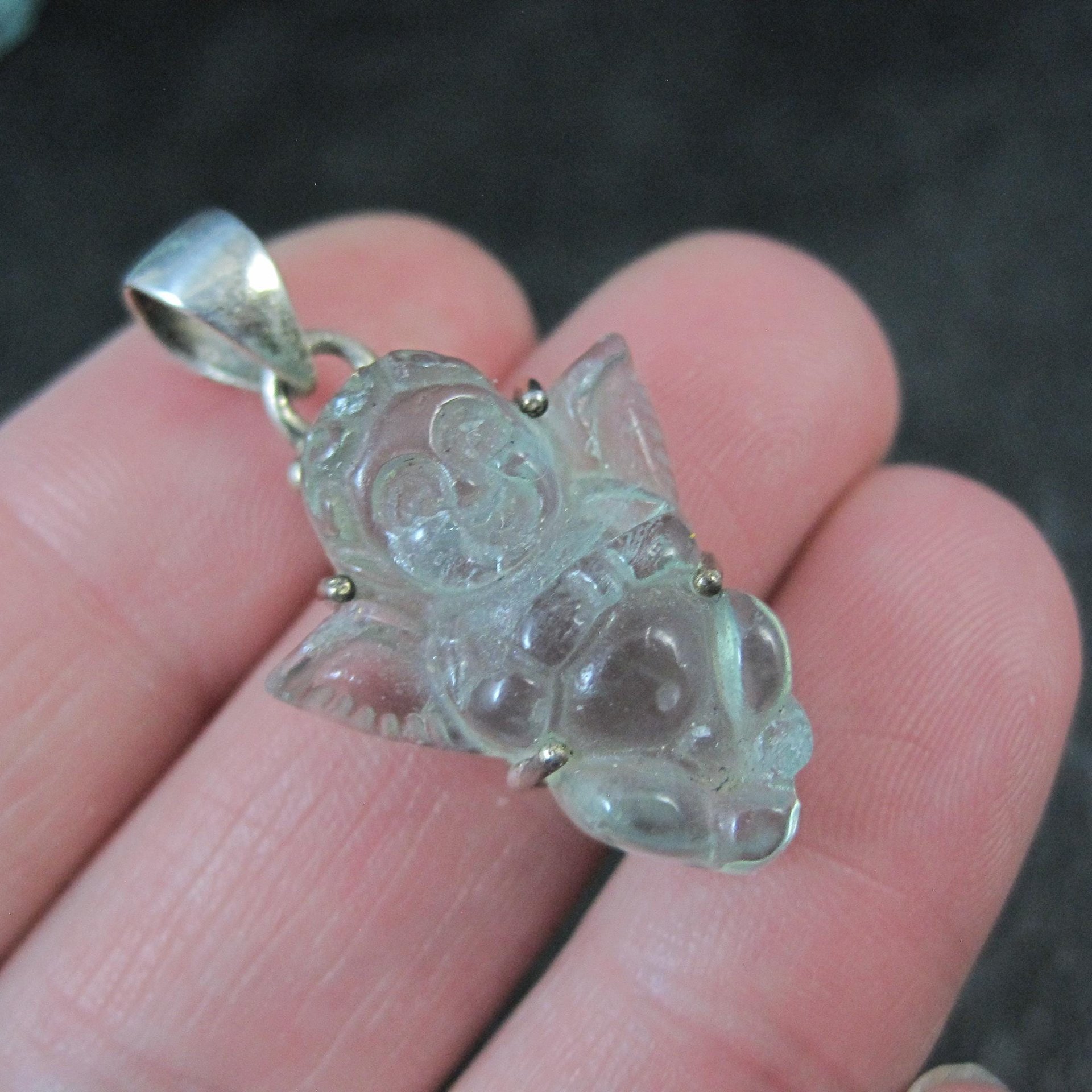 Carved Blue Topaz Cherub Pendant