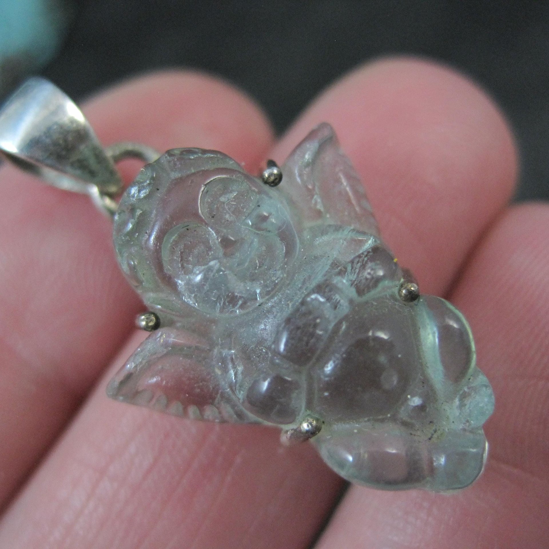 Carved Blue Topaz Cherub Pendant