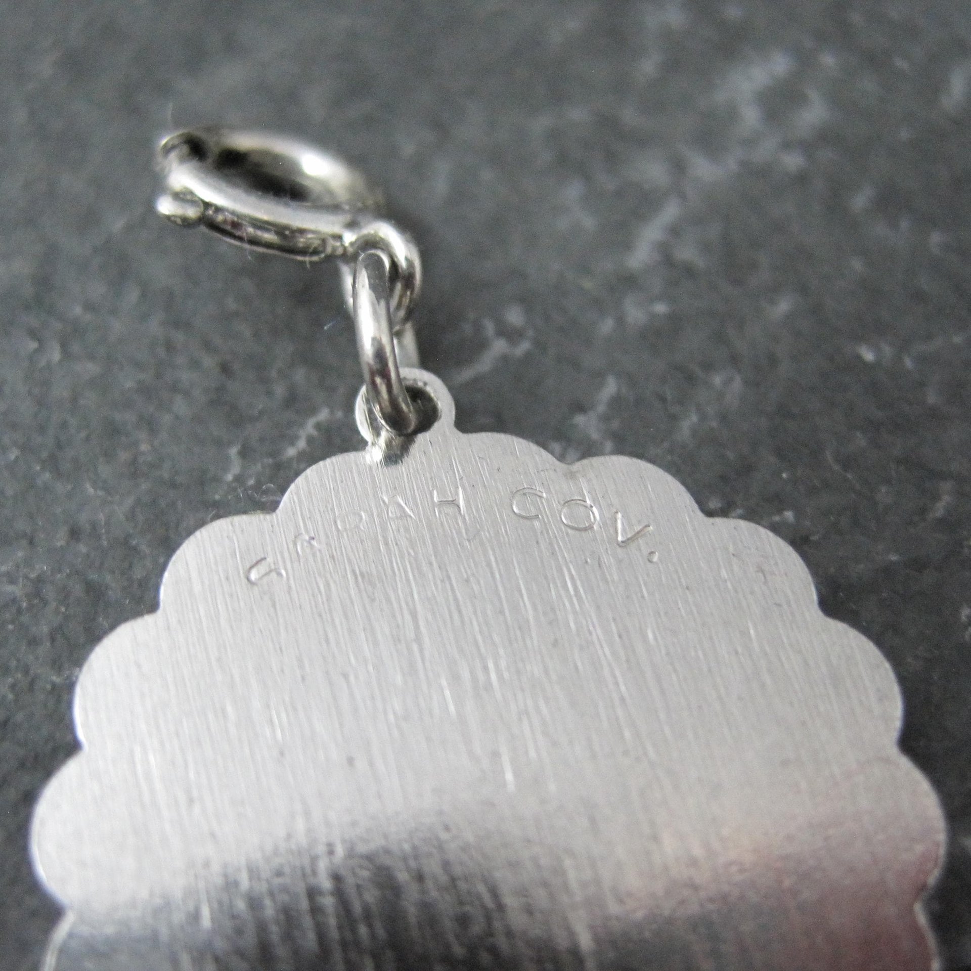 1976 Saturdays Child Charm Sarah Coventry