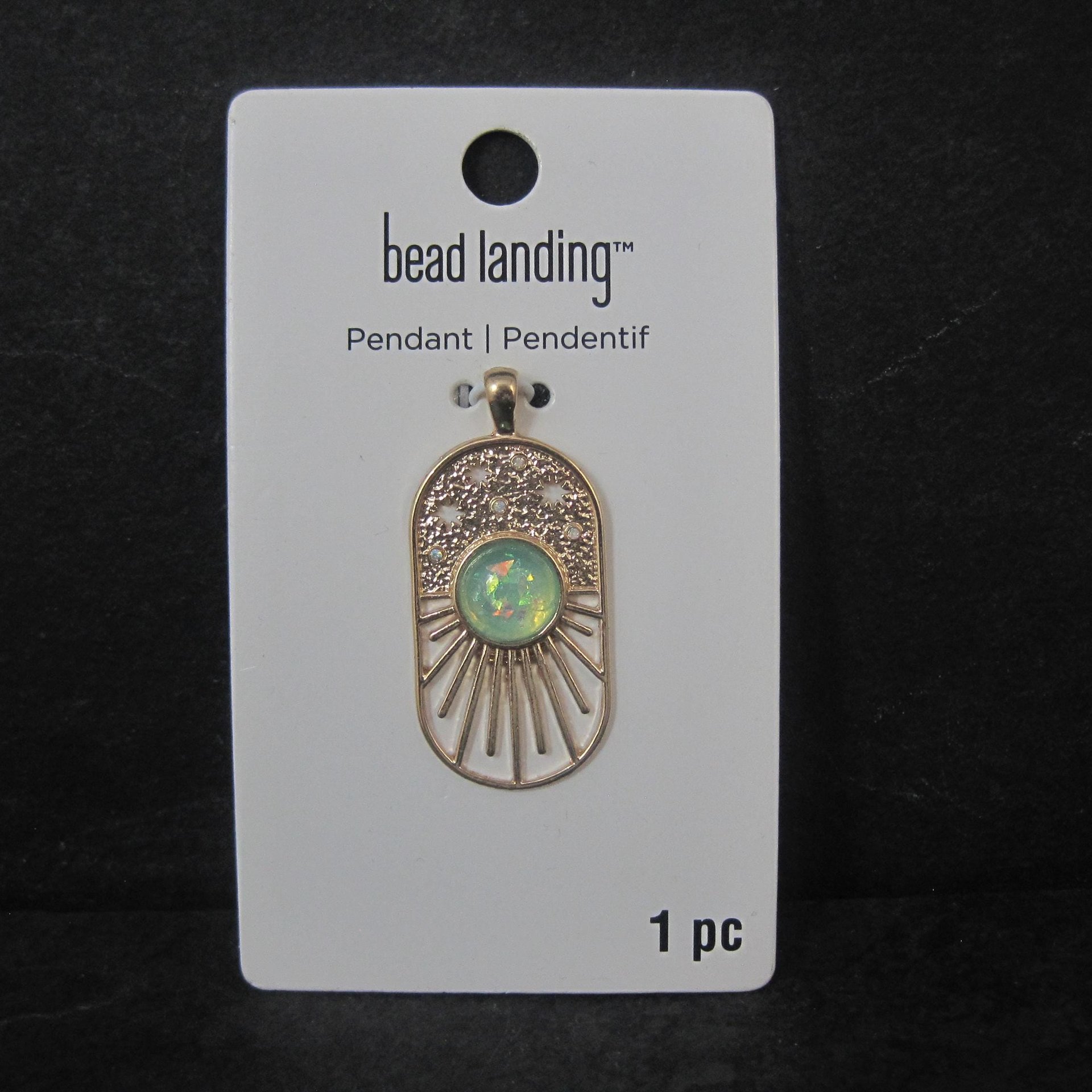Gold Sunburst Pendant by Bead Landing