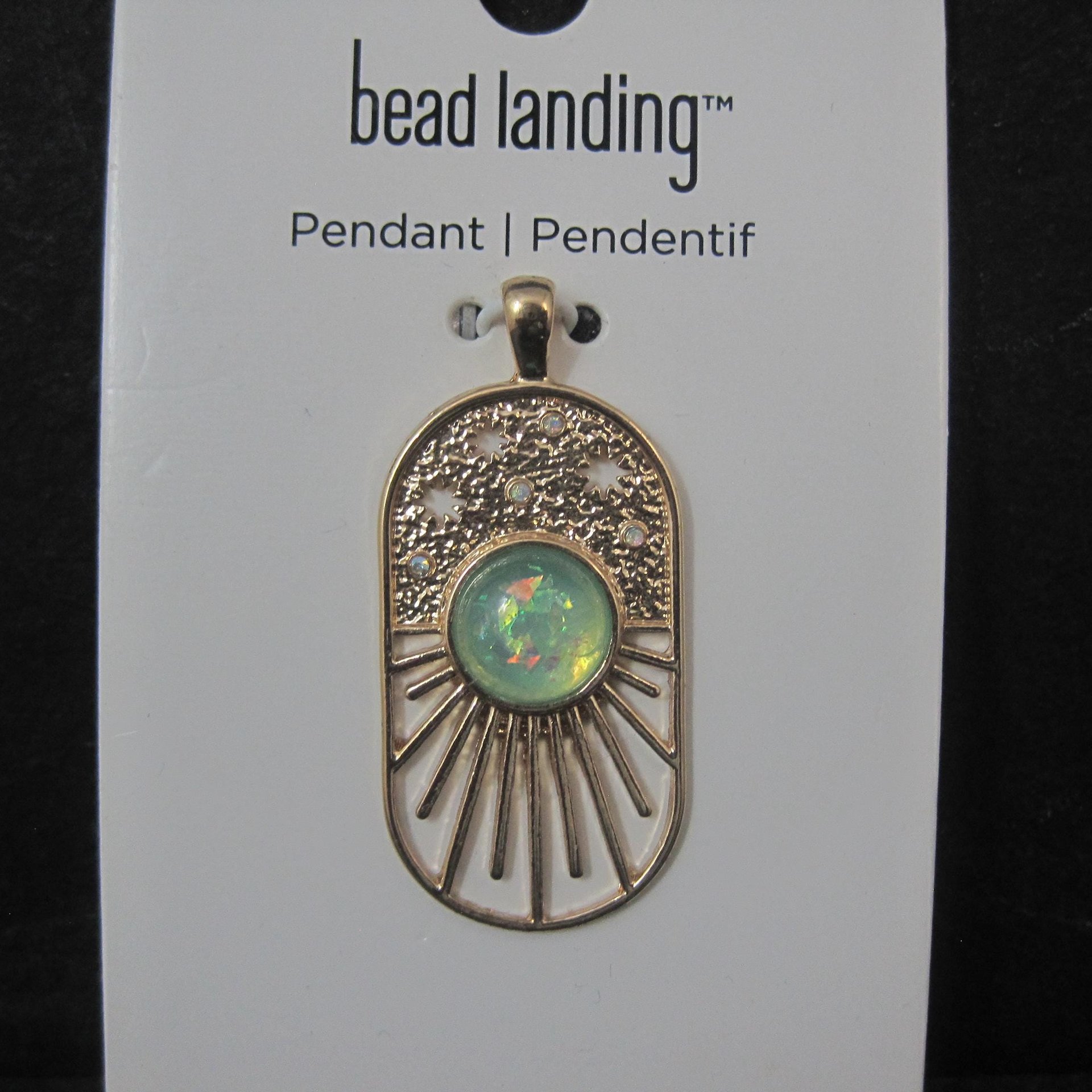 Gold Sunburst Pendant by Bead Landing