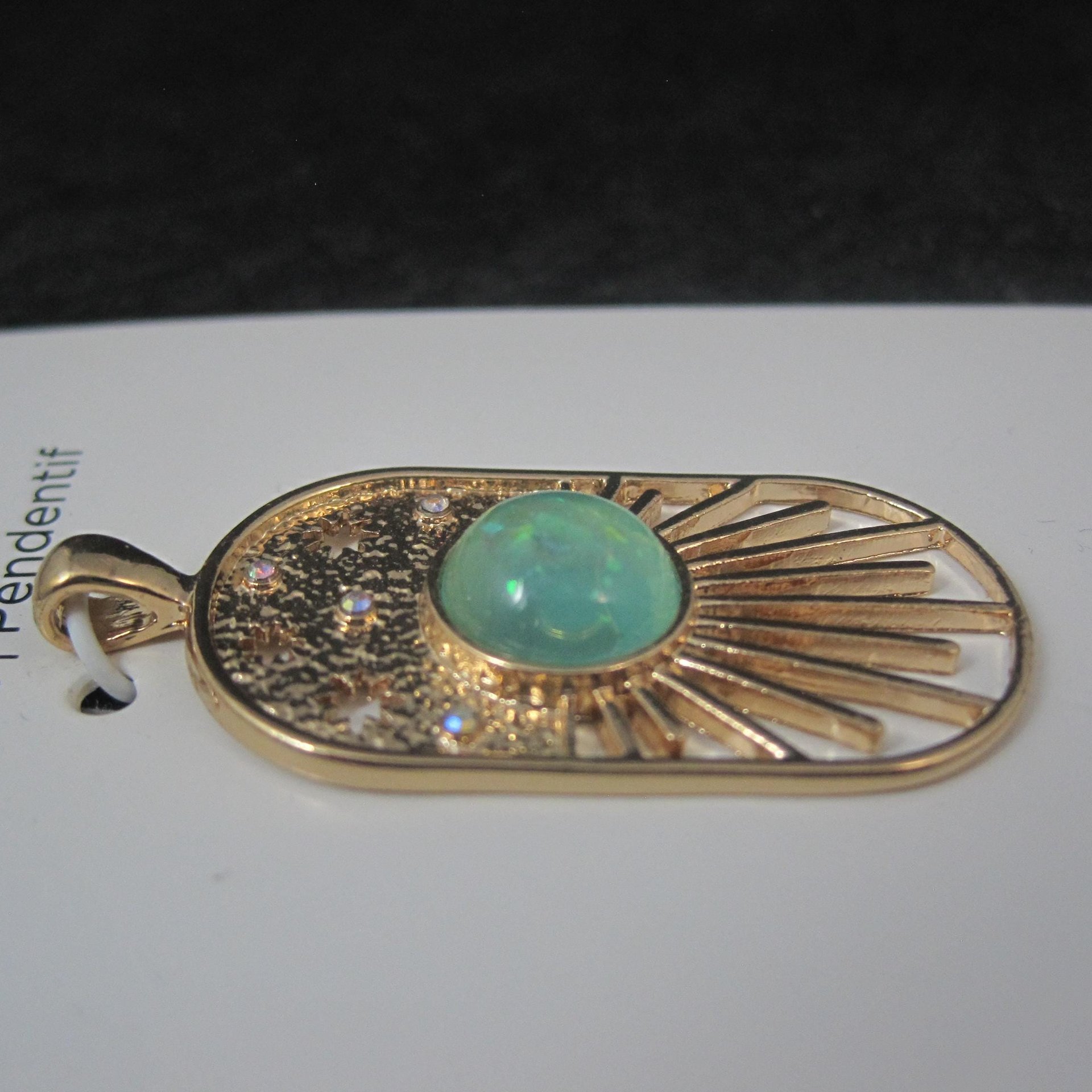 Gold Sunburst Pendant by Bead Landing