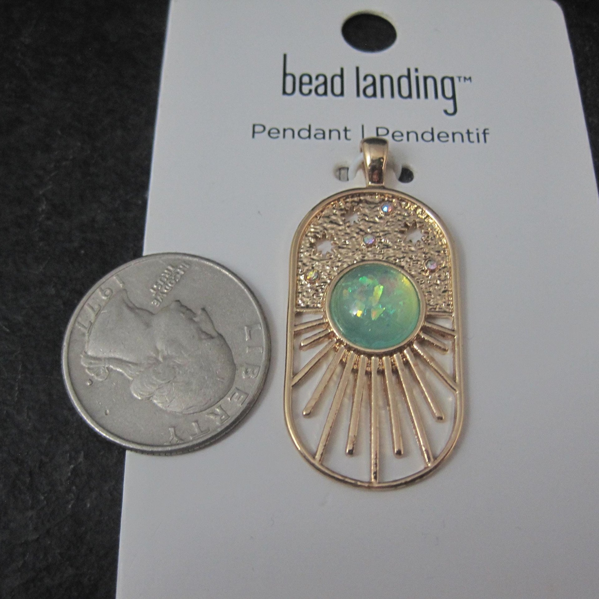Gold Sunburst Pendant by Bead Landing