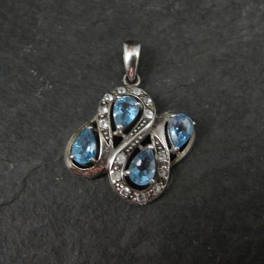 Unique Sterling Silver Blue Topaz & Diamond Pendant
